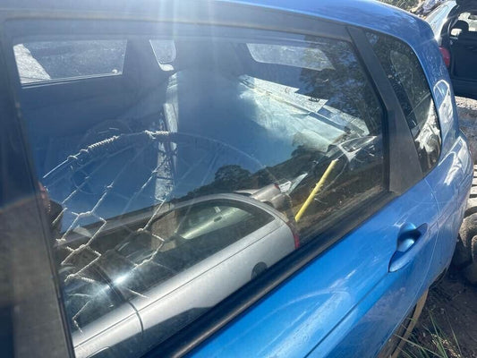 2007 Kia Cerato LH Passengers Rear Window Glass #B272