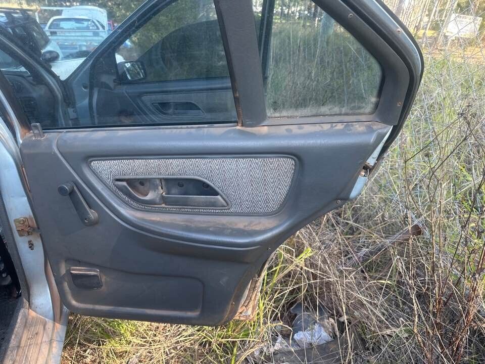 1990 Ford Ea Falcon RH Drivers Rear Door Trim #B400