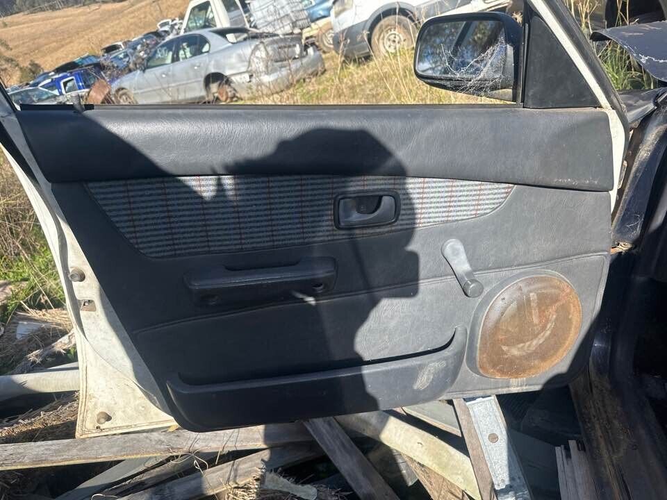 1993 Daihatsu Charade LH Passengers Front Door Trim #B340