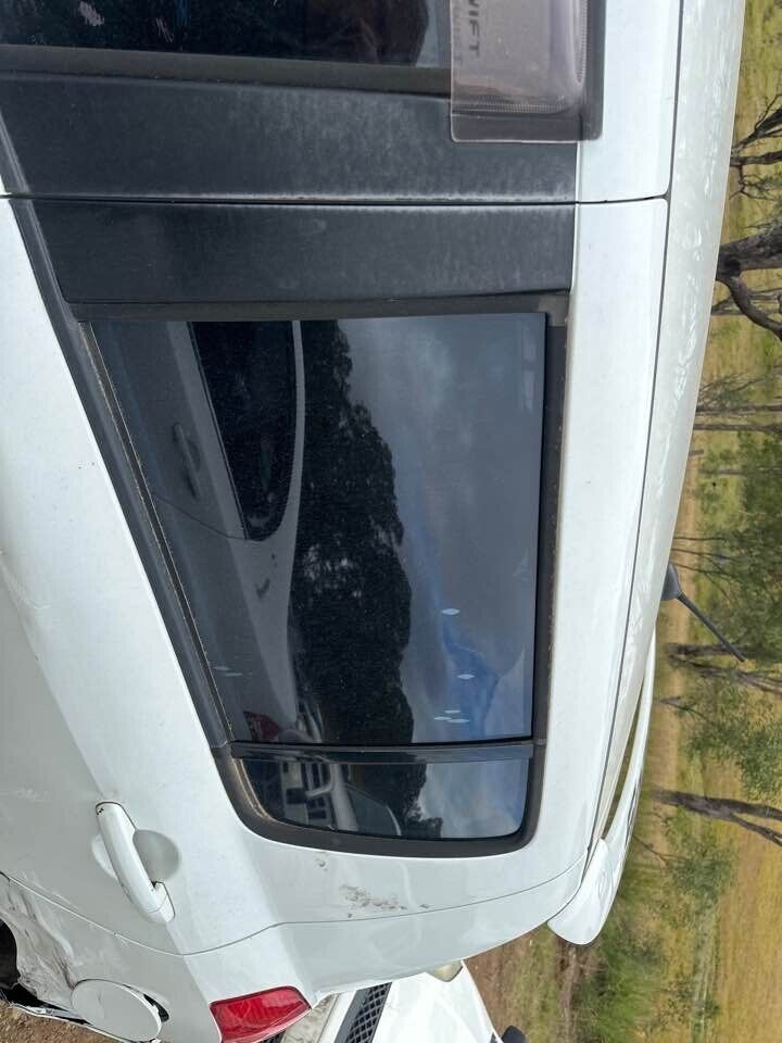 2007 Suzuki Swift LH Passengers Rear Window Glass #B228