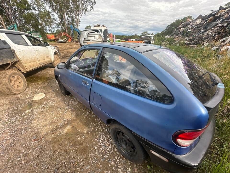 1996 Ford Festiva Brake caliper LH Passengers Front #B217