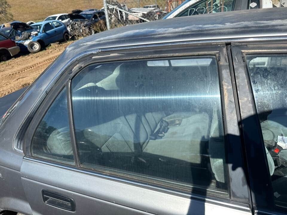 1992 Toyota Corolla RH Drivers rear Window Glass #B241